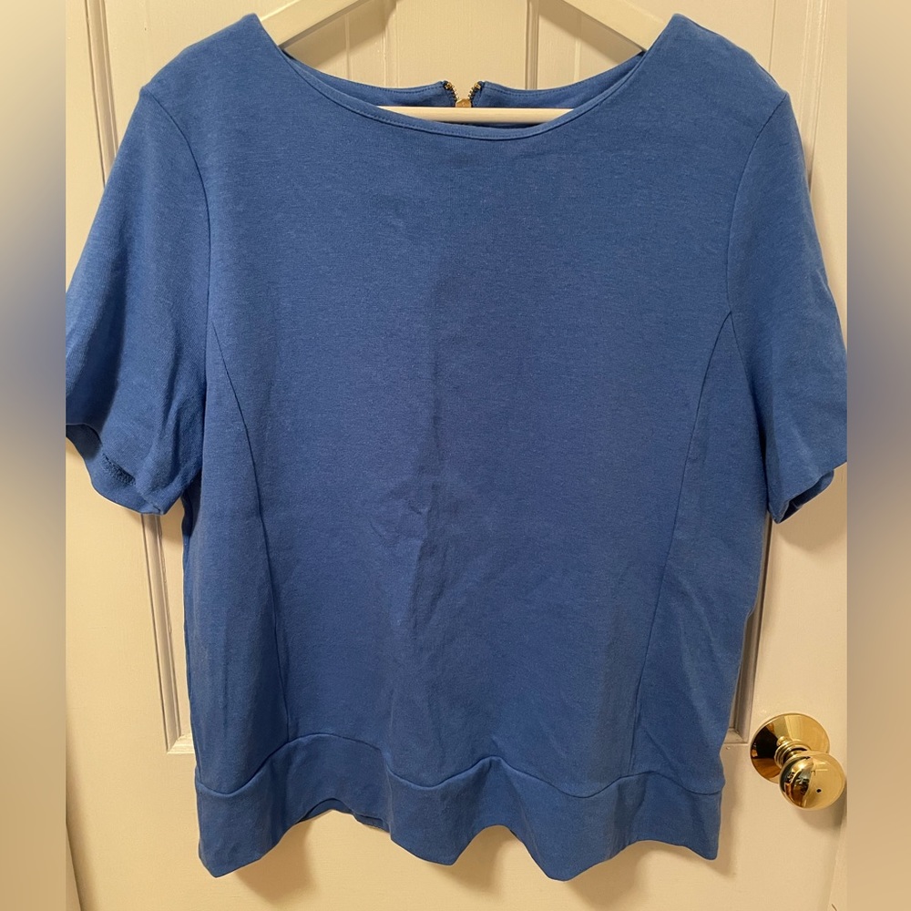 Talbots blue peplum style top. Gold zipper on back.